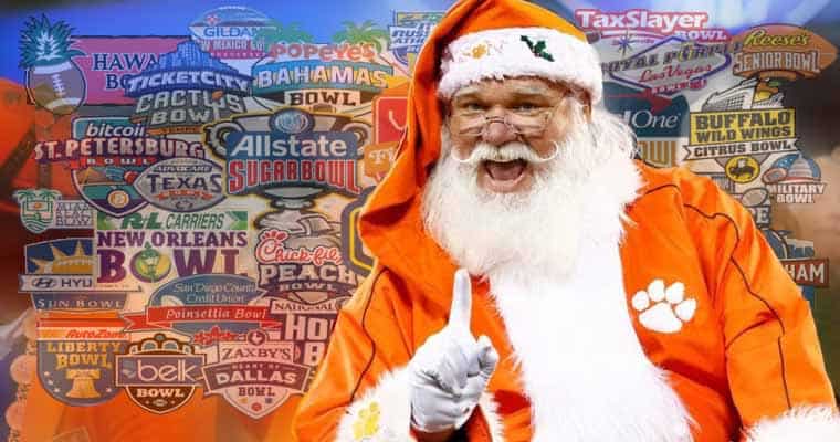 Santa in front of bowl game logos