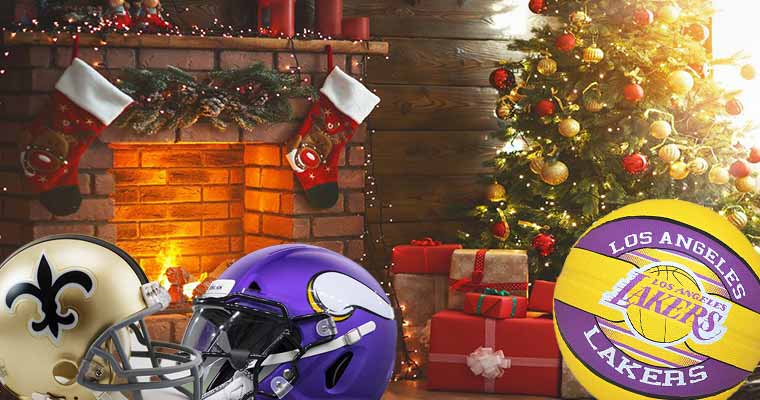 NFL helmets and a Lakers basketball next to a Christmas tree