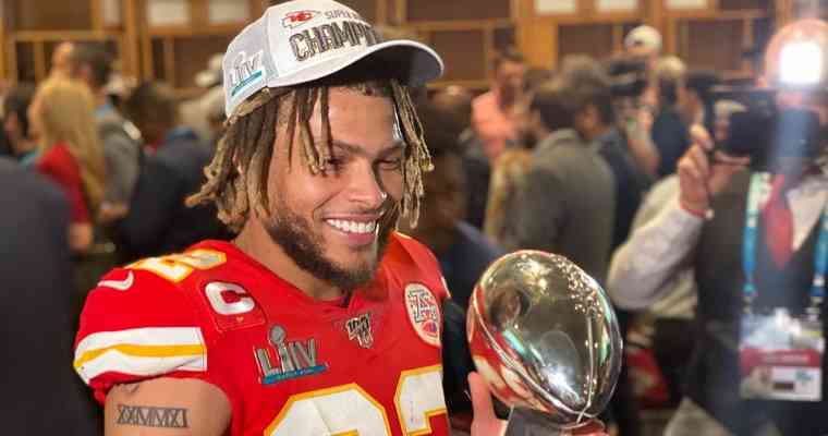 Tyrann Mathieu holding a Lombardi Trophy after Super Bowl 54