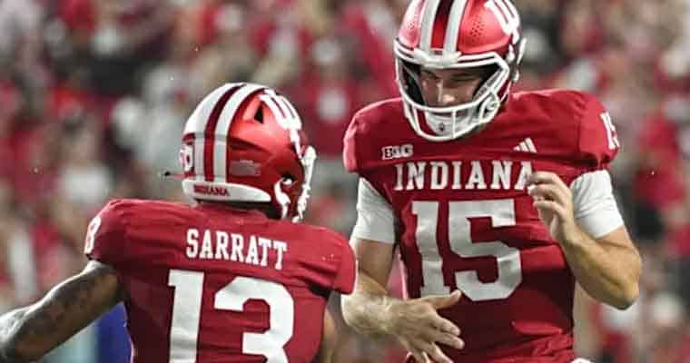 Nick Mendoza celebrating with an Indiana Hoosiers teammate