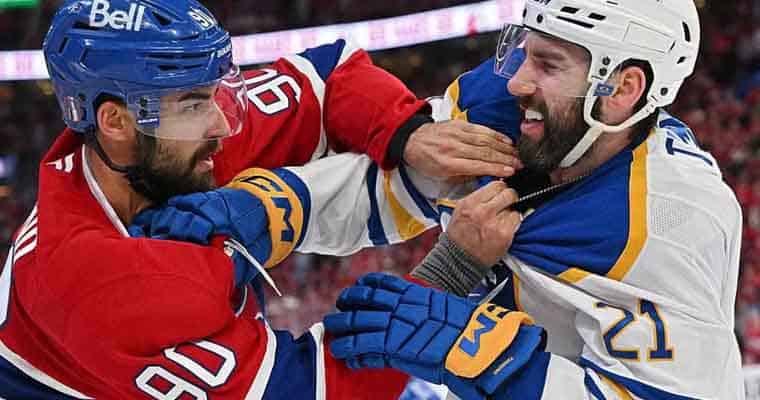 a Sabres and a Canadiens' player fighting