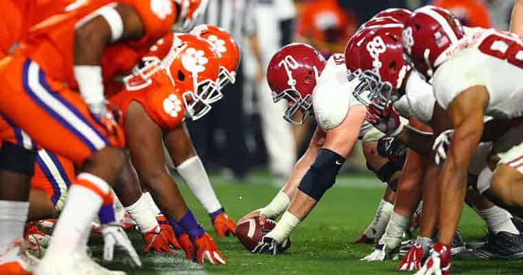 Clemson and Alabama line up on field