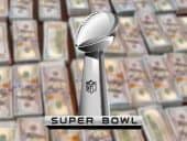 The Lombardi Trophy in front of stacks of cash