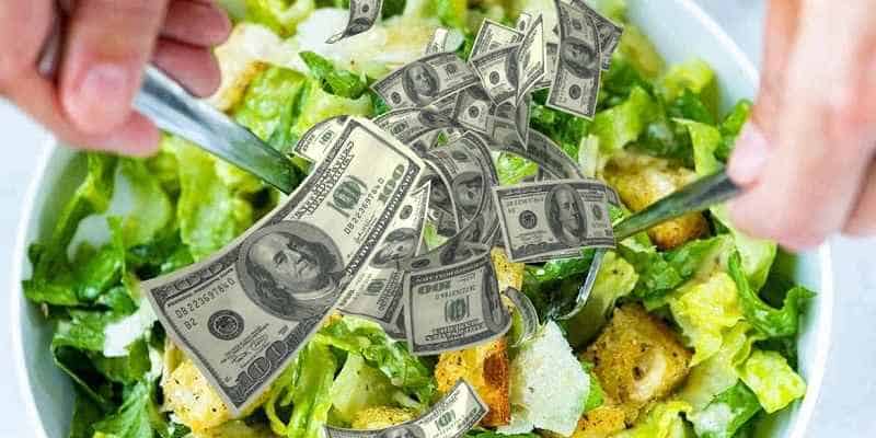 caesar salad with dollar bills