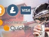 super bowl trophy with litecoin, bitcoin, visa, quickbit logos