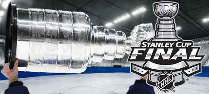 the hoisting of a Stanley Cup next to a Stanley Cup Final logo