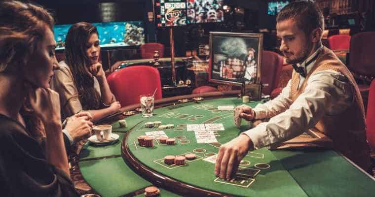 women at a blackjack table