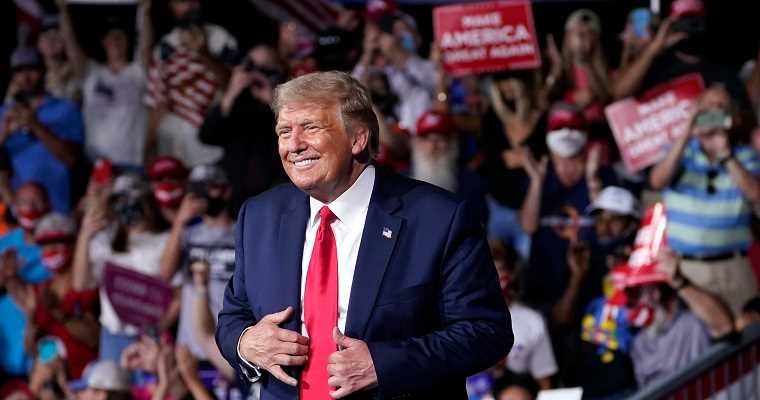 donald trump smiling at a trump rally in north carolina